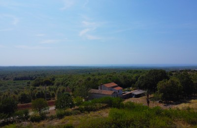 Višnjan, surroundings, attractive land with a sea view!